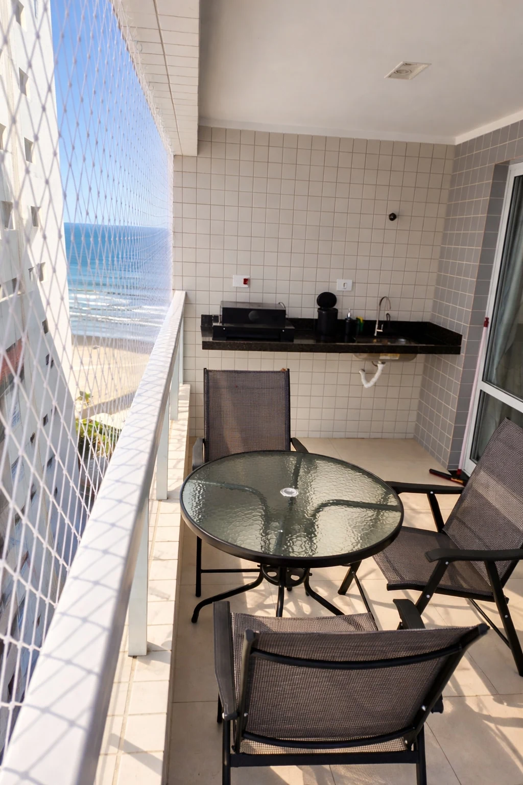 Balcony and sink, beachfront apartment in Praia Grande
