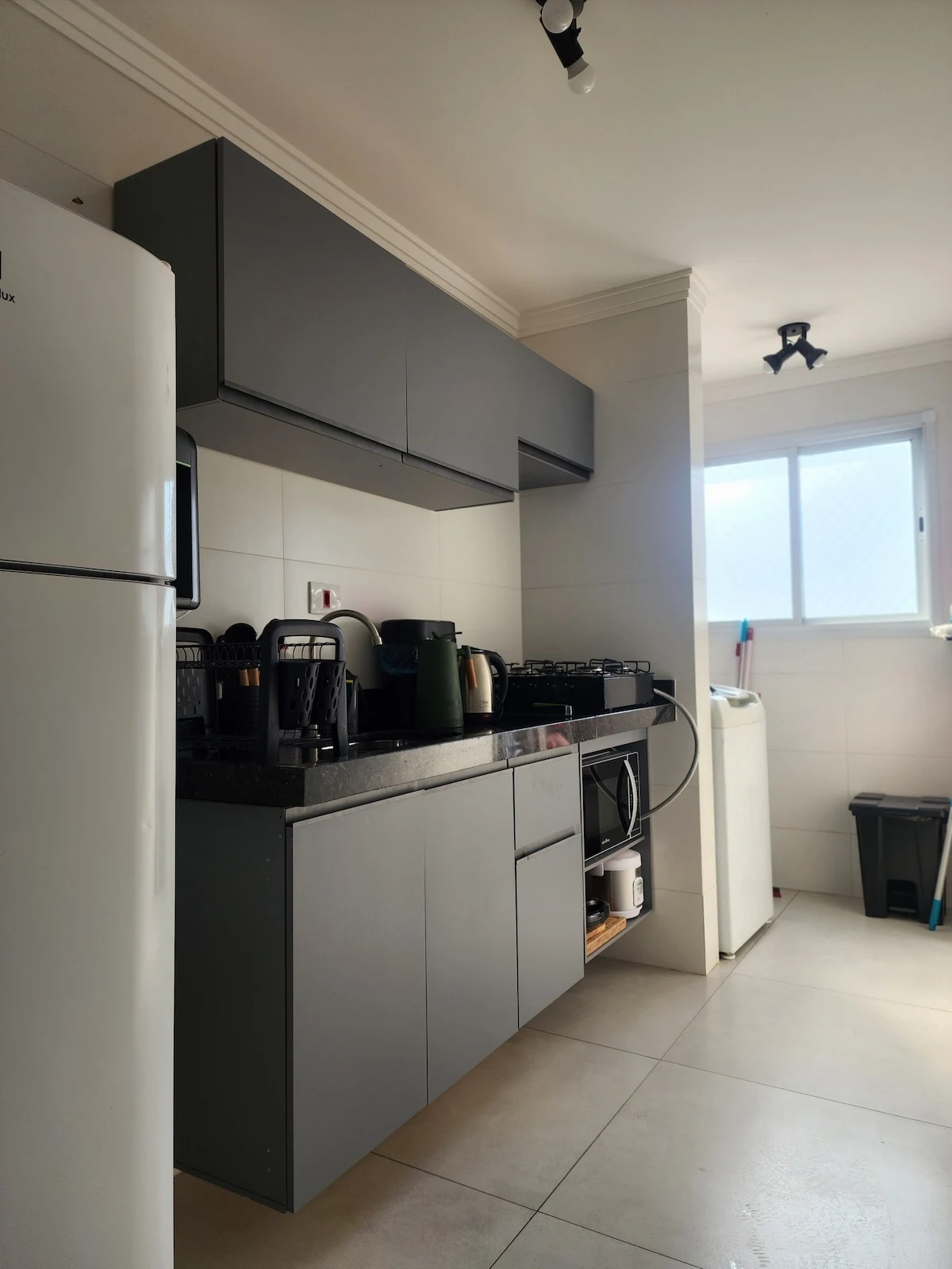 Refrigerator and countertop, beachfront apartment in Praia Grande